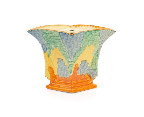 Wade Heath Art Deco flower vasedecorated with stylised brickwork on an orange stepped plinthprinted marks to the base16cm hig