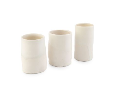 Colin Pearson (1923-2007)Three porcelain glaze test cylinderstallest 9cm high (3). Provenance:The collection of David Whiting