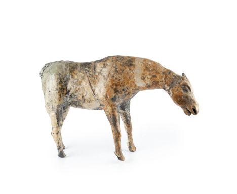 Rosa Ngyuen (b.1960)Model of a horse ceramicunmarked26cm high x 41cm wide. Provenance:The late Oliver Watson (1949-2023), Bri