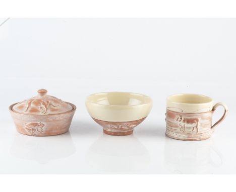 Philip Wood (b.1957) Bowl, mug, and casserole dish and coverearthenware, each decorated with animalseach piece with impressed