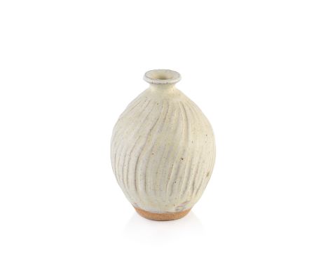 Katharine Pleydell-Bouverie (1895-1985)Vasecream glaze, with incised decorationimpressed potter's seal11.5cm high.  The potte