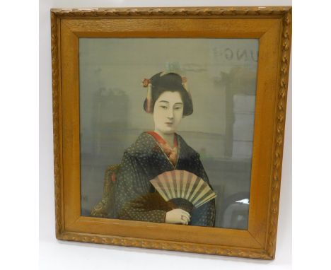Japanese School (late 19thC). Half length portrait of a Geisha Girl holding a fan,  print on silk, seal signature, 58cm x 55c