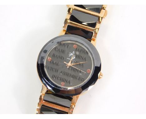 An Ardier stainless steel garnet and ceramic unisex wristwatch, black dial with centre seconds, with certificate.
