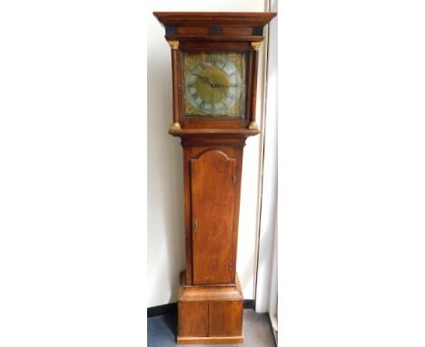 A Georgian oak long case clock by Katterns of Thrapstone, the square brass dial with silver chapter ring bearing Roman and Ar