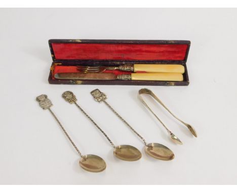 A Victorian silver travelling fruit knife and fork, with ivory handles, cased, George Unite, Birmingham 1839, a pair of silve