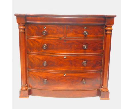 A Victorian Scottish flame mahogany bow front chest,  of two short over three long drawers, with cushion drawers above, flank