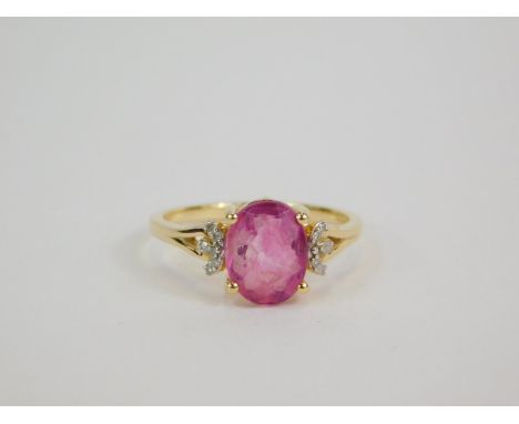 A 9ct gold pink fluorite and diamond ring, claw set, size L/M, 1.72g gold, with certificate.