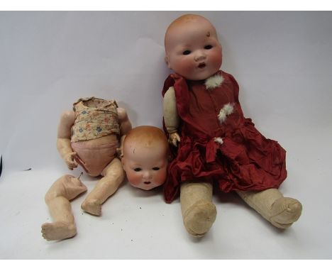 Two Armamd Marseille bisque head dolls 