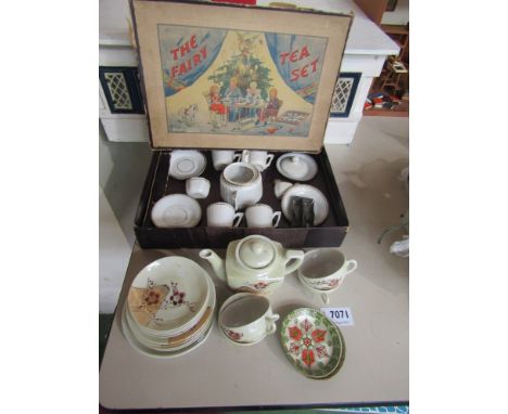 A boxed 'The Fairy Tea Set' dolls tea service c.1910, comprising eleven pieces for four settings, white ground with gilt edgi