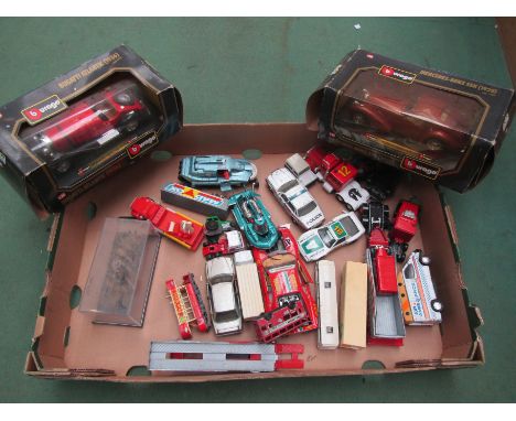 Two boxed Burago 1:24 scale diecast cars and assorted loose playworn diecast cars