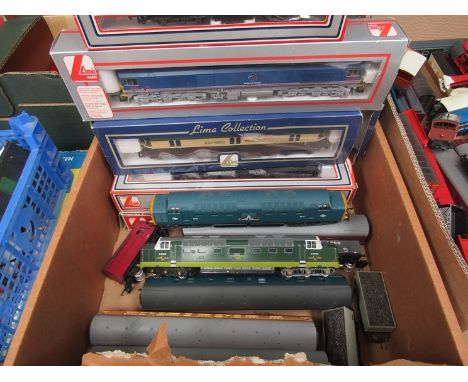 A collection of boxed and loose Lima 00/HO gauge locomotives and rolling stock including boxed 205143A7 Express Parcels No.34