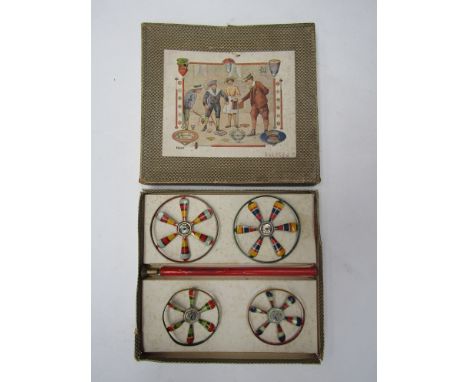 A boxed Marklin tinplate spinning top set 