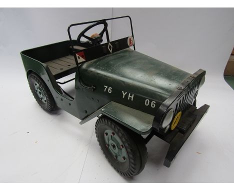 A Tri-ang military Jeep pressed tin pedal car with folding windscreen 