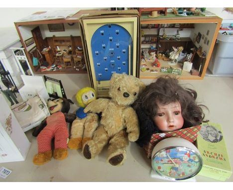 A quantity of vintage toys including bagatelle, tedyy and German porcelain dolls head 