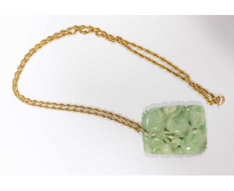 A Chinese carved jade pendant, formed as fruit and leaves, suspended on a 9ct gold chain.