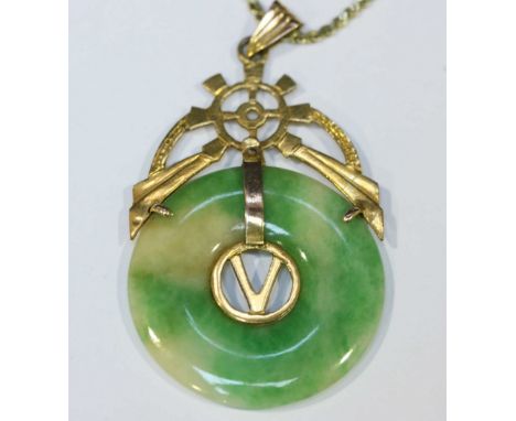 A Chinese 14ct gold and jade roundel pendant on chain.