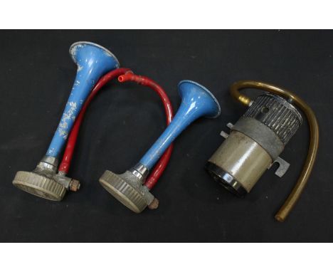 A pair of vintage 'Fiamm' car horns in blue, makers plate marked 'Tip TA/O, Serie "2000", DGM 5857 KA A 7337, AGREE TP. AR 62