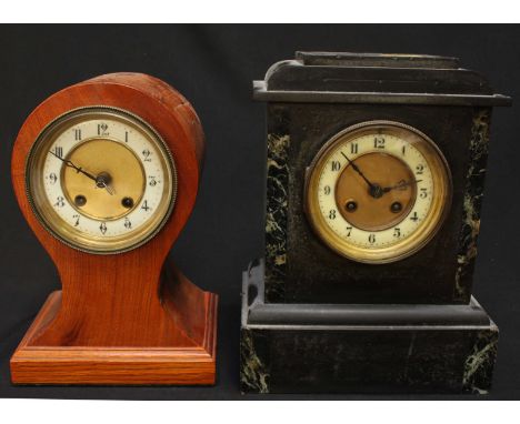 A Victorian black slate mantel clock, together with an oak balloon clock. (2)