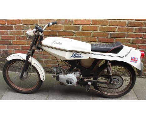 A 1979 Kestrel 50cc sports moped, automatic Minarelli engine, white, compete but minus one side panel, ex-display model with 