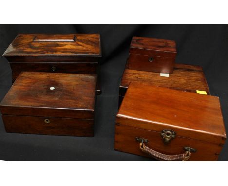 A 19th  century rosewood sarcophagus shaped tea caddy with vacant interior, together with two Victorian work boxes and an ear