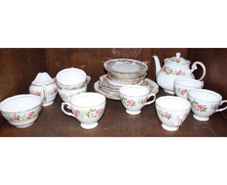SECTION 33 - A Colclough tea service comprising of 28 pieces, decorated  in a gilt and floral design