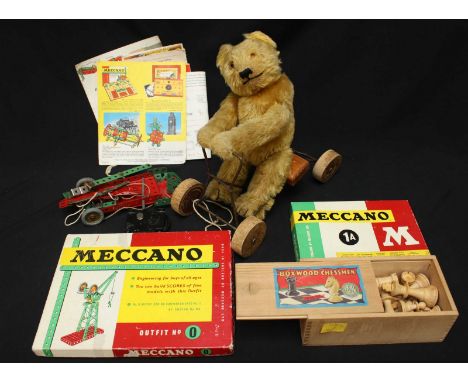 A Meccano Outfit No. 0 Engineering set, together with a boxwood chess set and an early 20th century mohair teddy bear riding 