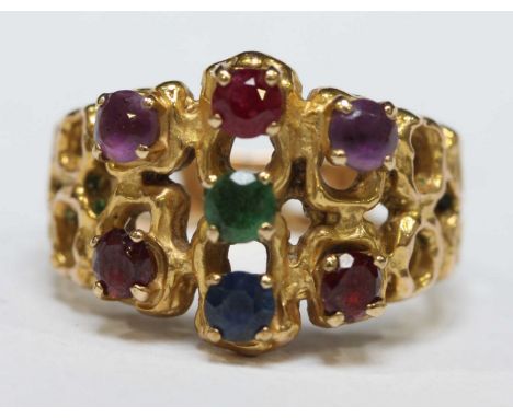 A 9ct gold naturalistic dress ring, set with ruby, emerald, sapphire, garnet and amethyst stones, 5.6 grams.