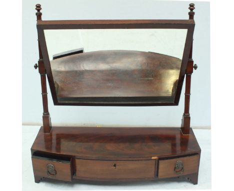 A 19th century  mahogany dressing table mirror, with swivel mirrored panel, the base with three small drawers. 66.5 cm wide.