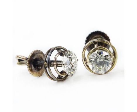 Pair of Antique Approx. 1.10 Carat TW Old European Cut Diamond Stud Earrings. Diamonds measure 5.0 x 3.5mm, H-I color, SI1-SI