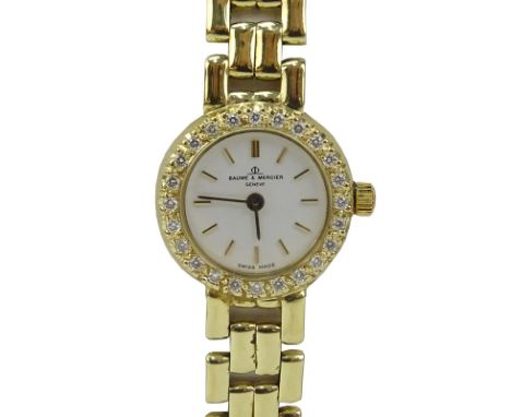 Lady's Vintage Baume & Mercier Genève 14 Karat Yellow Gold Bracelet Watch with Diamond Bezel and Swiss Quartz Movement. Signe