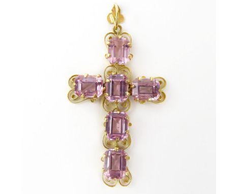 18 Karat Yellow Gold and Pink Stone Cross Pendant. Stamped 18K. Good vintage condition. Measures 2-3/8" H, 1-1/4" W. Approx. 