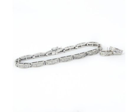 Vintage Approx. 3.0-3.5 Carat Baguette Cut Diamond and 14 Karat White Gold Bracelet and Earring Suite. Stamped 14K. Good vint
