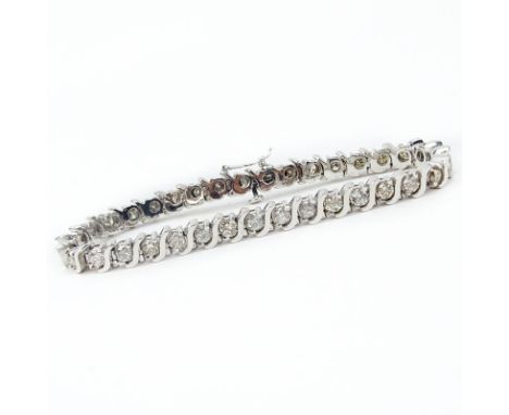 Vintage Approx. 3.50 Carat Round Brilliant Cut Diamond and 14 Karat White Gold Bracelet. Diamonds J-K-L color, SI1-I1 clarity