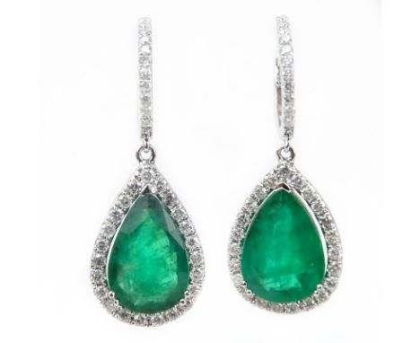 Approx. 6.59 Carat Pear Shape Colombian Emerald, 1.0 Carat Round Brilliant Cut Diamond and 18 Karat White Gold Earrings. Emer