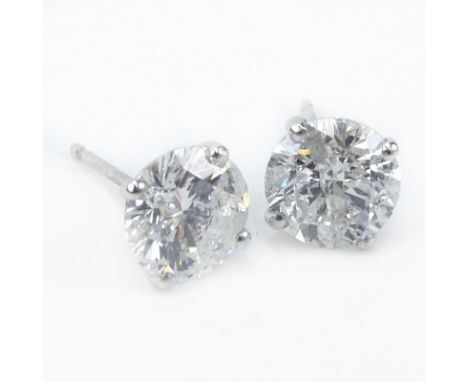 Approx. 2.72 Carat TW Round Brilliant Cut Diamond and 14 Karat White Gold Ear Studs. Approx. weight: 1.33 grams. Shipping $30