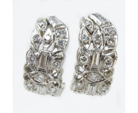 Vintage Approx. 2.25 Carat TW Diamond and Platinum Earrings. Diamonds F-G color, VS1 clarity. Unsigned. Good condition. Pleas