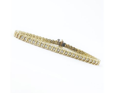 Vintage Approx. 2.25 Carat TW Round Brilliant Cut Diamond and 14 Karat Yellow Gold Bracelet. Stamped 14K. Very good condition