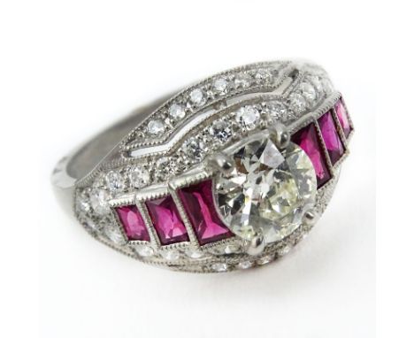 Approx. 1.50 Carat Diamond, .60 Carat Ruby and Platinum Ring set in the center with an Approx. .95 Carat Round Brilliant Cut 