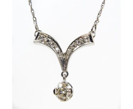 Vintage Diamond and 14 Karat White Gold Pendant Necklace set with a .67 Carat Old European Cut Diamond. Diamond H color, SI3 