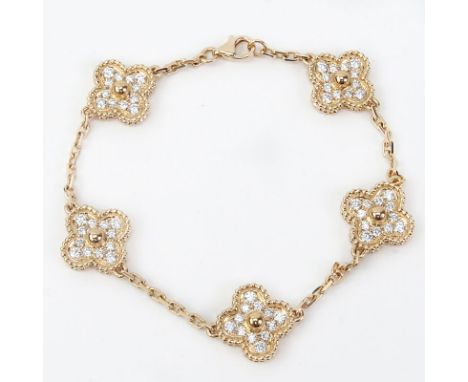 Van Cleef & Arpels style Diamond and 18 Karat Rose Gold Alhambra Bracelet. Stamped 750. Very good condition. Measures 7-1/4" 