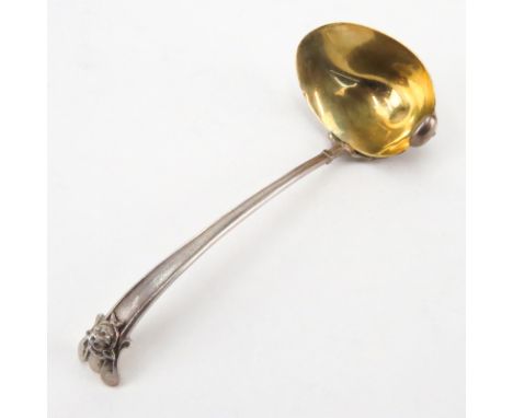 Antique Silver Figural Ladle. Unusual motif of webbed foot, mask, gold washed bowl. Unsigned. Good condition. Measures 6" and