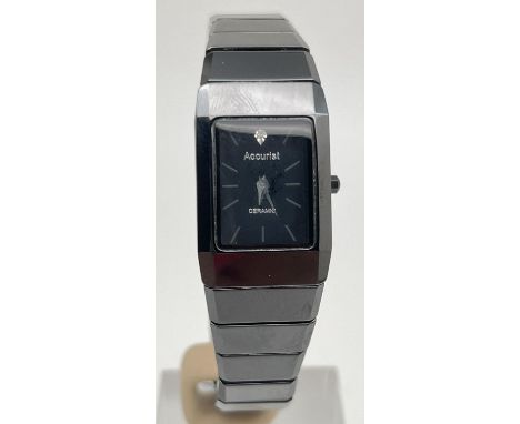 A ladies LB1562 black ceramic wristwatch by Accurist, with diamond to face. Accurist name to face. Vendor advises was recentl