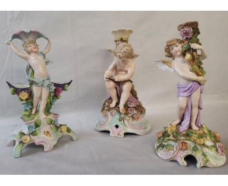 An early 20th century Schierholz Plaue porcelain candlestick; a Sitzendorf porcelain figural candlestick and another Continen