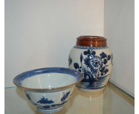 Two pieces of Chinese blue and white porcelain the first a ginger jar decorated with flowers and foliage, without lid, unmark