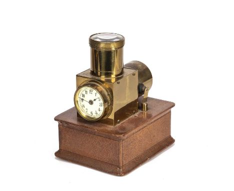 Ceiling projector clock or brothel clockEdwardian, brass cased, having a circular dial with Roman numerals on a brown leather