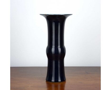 Blue porcelain yen yen vaseChinese, with a Kangxi six character mark, 28cm high With a hair crack to the rim.