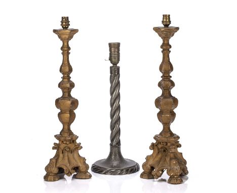 Pair of gilt painted wooden candlesticksof knopped form on tripod base, 55cm high including the fitting, and a singular pewte