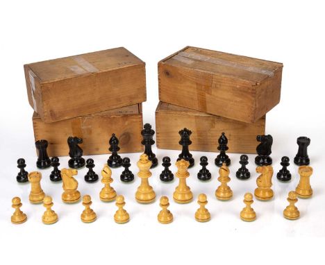 Four Staunton boxwood chess setseach in a sliding case, king 9cm highOverall wear and marks. Some pieces replaced and do not 
