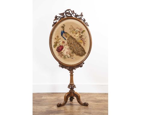 Walnut fire screenVictorian, with a tapestry panel of a peacock in wool threads, on a tripod base, 145cm x 66cmOverall scratc