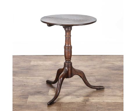 Oak tripod table late 18th/early 19th Century, with a circular top, 49.5cm x 47.5cm x 68cmThe top is a cross between an oval 